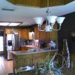 Kitchen before remodel, granite counter tops, undermount sink, tile backsplash